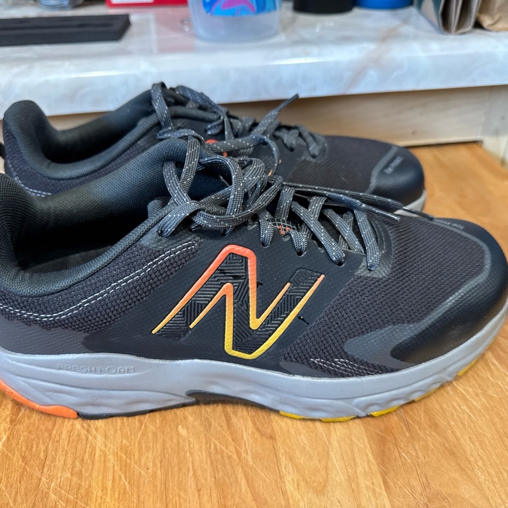 New Balance Black Sneakers with Orange Accent